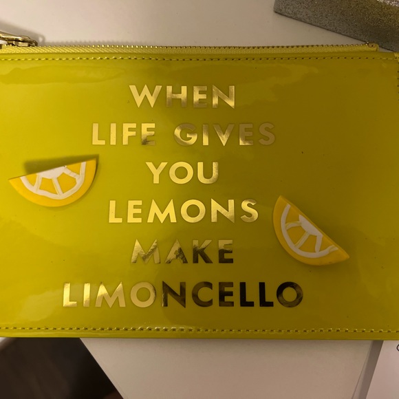 kate spade Handbags - New Kate Spade bright yellow lemon zip pouch w gold lettering & lemon earrings